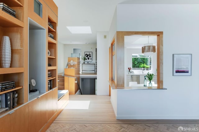 773 Duncan St, San Francisco, CA 94131 - corridor featuring a skylight and a sink
