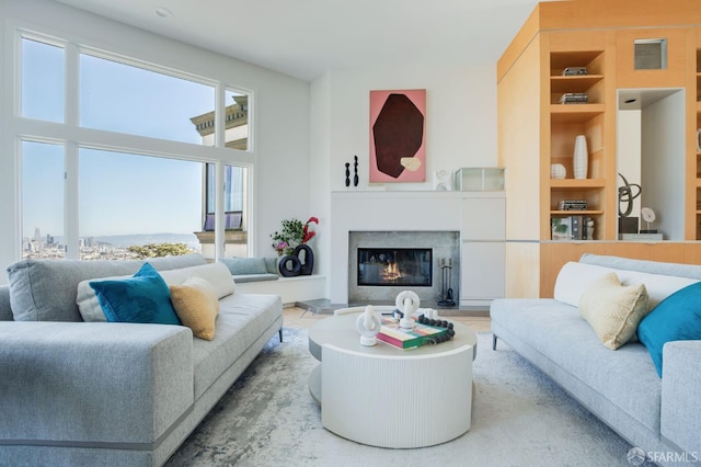 773 Duncan St, San Francisco, CA 94131 - living room featuring built in shelves and a glass covered fireplace