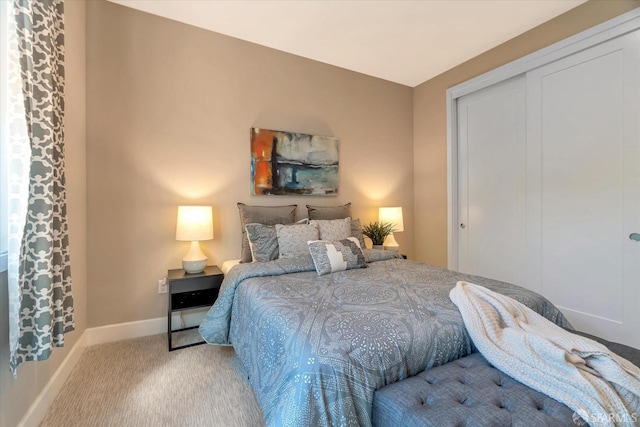 carpeted bedroom with a closet