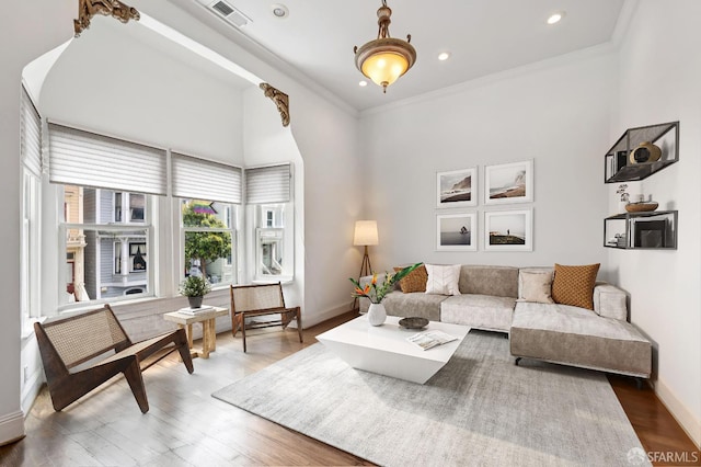 2922 Pine St, San Francisco, CA 94115 - living area featuring a high ceiling, wood finished floors, recessed lighting, and ornamental molding