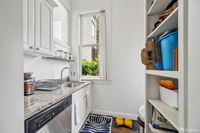 2922 Pine St, San Francisco, CA 94115 - kitchen with dishwasher, white cabinets, open shelves, and light stone countertops