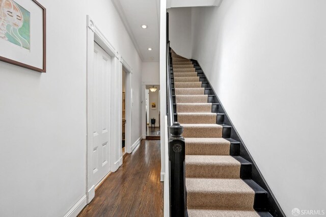 2922 Pine St, San Francisco, CA 94115 - stairway with recessed lighting and wood finished floors