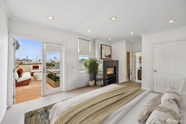 2922 Pine St, San Francisco, CA 94115 - bedroom featuring access to exterior, ornamental molding, multiple windows, recessed lighting, and a glass covered fireplace