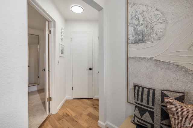 hallway featuring light hardwood / wood-style floors