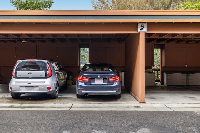 view of car parking featuring a carport