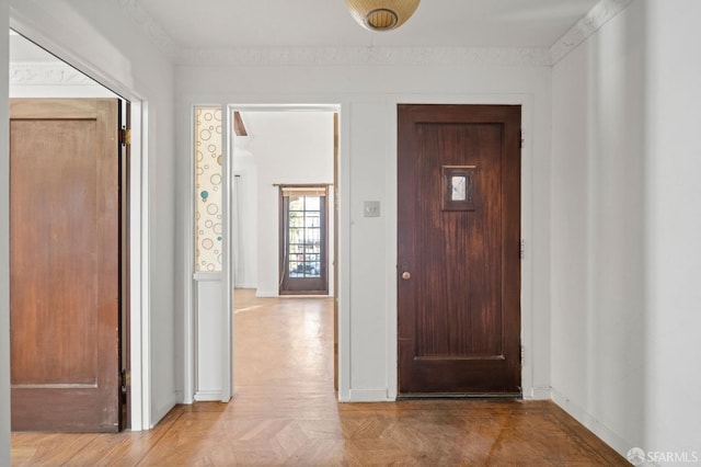 foyer featuring light parquet flooring