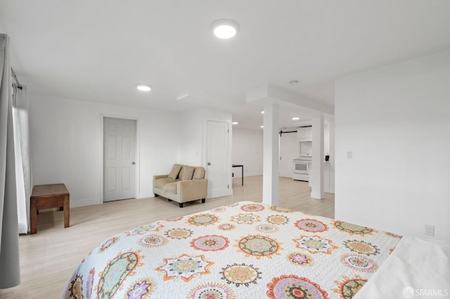 bedroom featuring light wood-type flooring