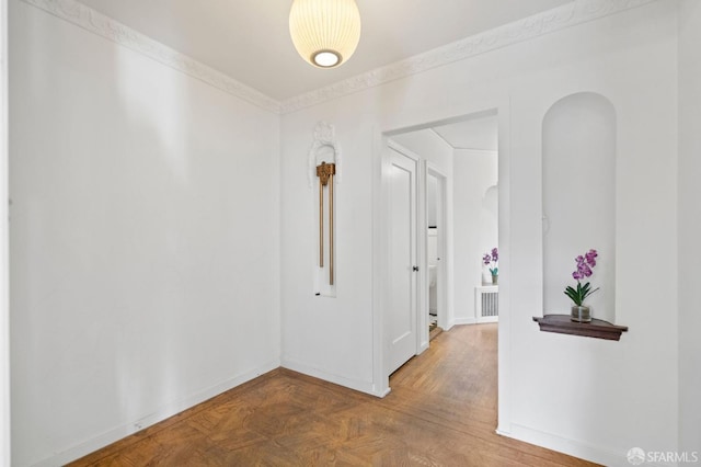 hallway with parquet flooring