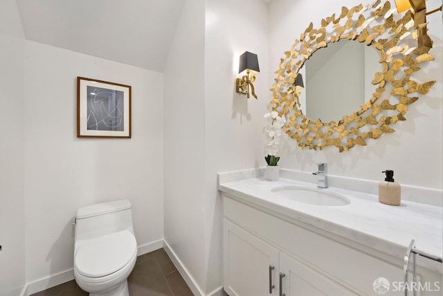 16 Barneson Ave, San Mateo, CA 94402 - bathroom featuring vanity, toilet, baseboards, vaulted ceiling, and tile patterned flooring