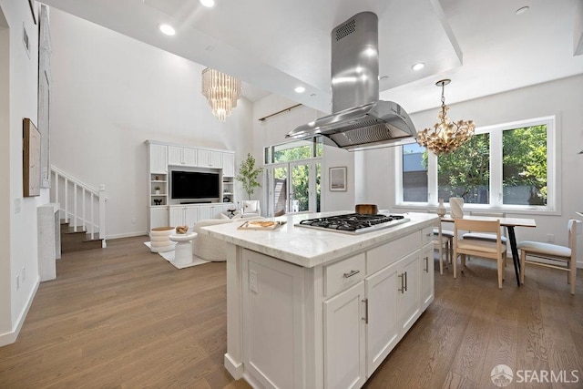 16 Barneson Ave, San Mateo, CA 94402 - kitchen with a chandelier, gas cooktop, island range hood, white cabinetry, and recessed lighting