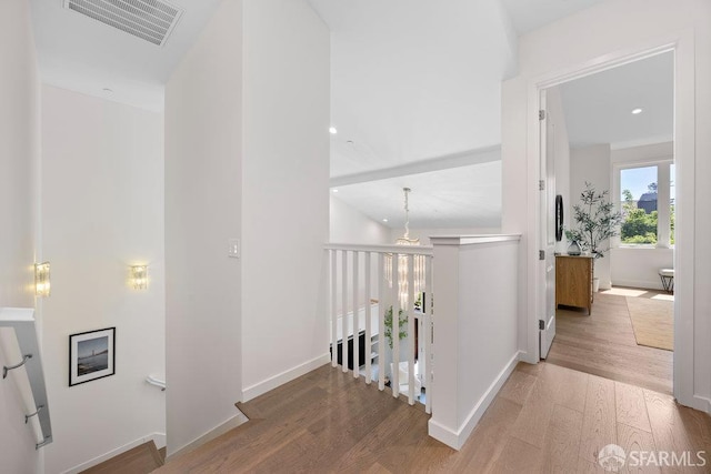 16 Barneson Ave, San Mateo, CA 94402 - hallway with wood finished floors, baseboards, an upstairs landing, and recessed lighting
