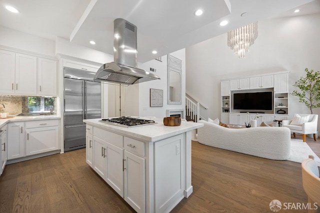 16 Barneson Ave, San Mateo, CA 94402 - kitchen with island range hood, stainless steel appliances, dark wood-type flooring, open floor plan, and white cabinets