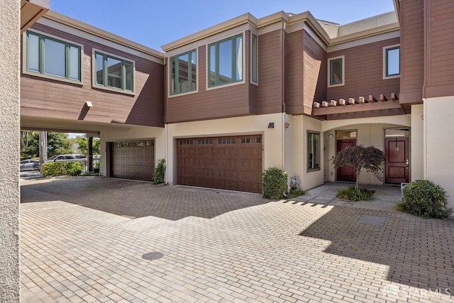 16 Barneson Ave, San Mateo, CA 94402 - multi unit property with a garage, driveway, and stucco siding