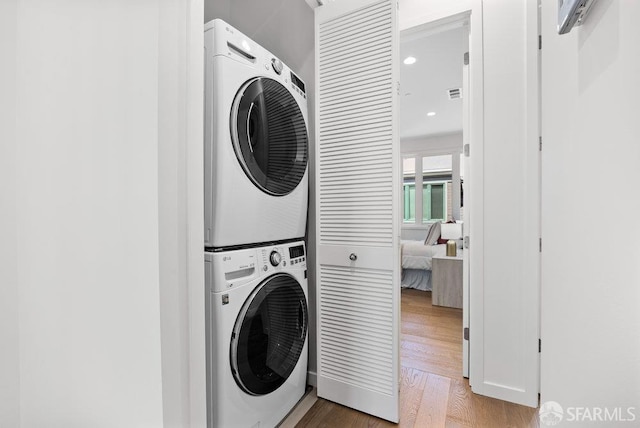 16 Barneson Ave, San Mateo, CA 94402 - washroom with stacked washing machine and dryer, light wood-style floors, and recessed lighting
