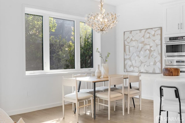 16 Barneson Ave, San Mateo, CA 94402 - dining area with light wood-style flooring and a chandelier