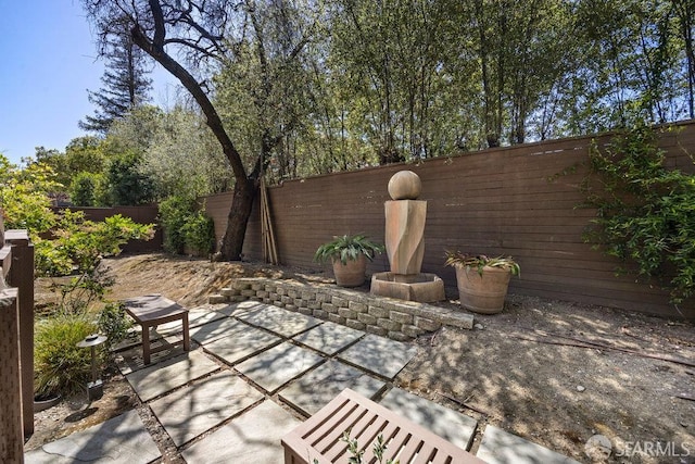 16 Barneson Ave, San Mateo, CA 94402 - fenced backyard featuring a patio area