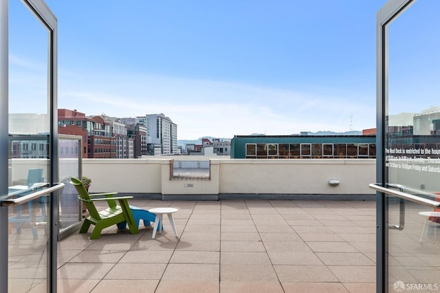 balcony featuring a city view