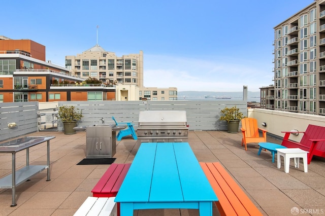 view of patio / terrace with a sink and a grill