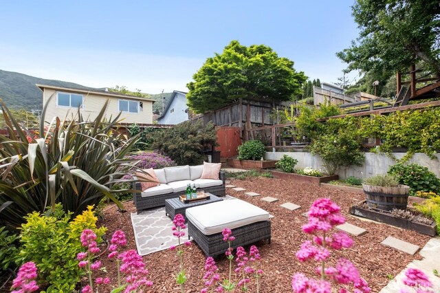 view of yard with an outdoor hangout area, a fenced backyard, and a patio