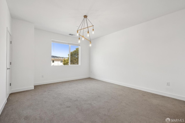 3821 Wattling St, Oakland, CA 94601 - carpeted spare room with a chandelier and baseboards