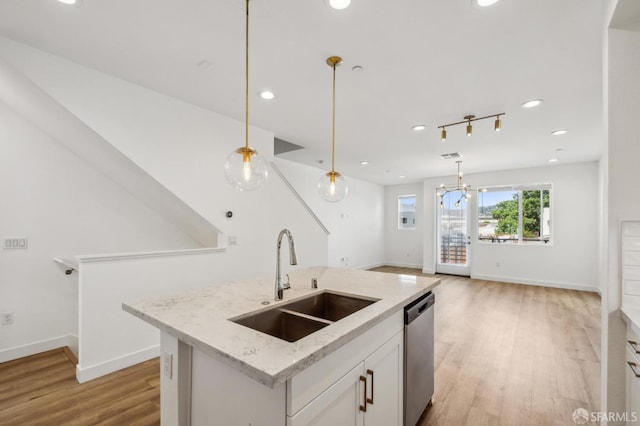 3821 Wattling St, Oakland, CA 94601 - kitchen with dishwasher, a sink, light wood-type flooring, baseboards, and decorative light fixtures