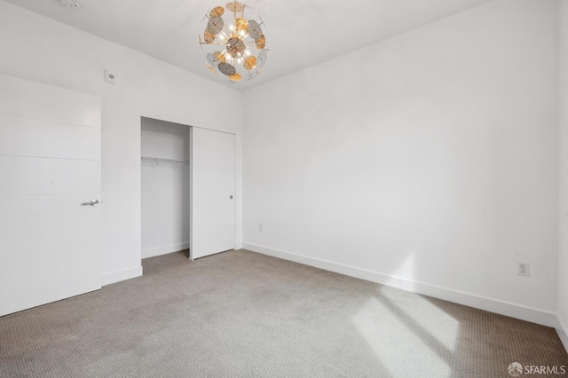 3821 Wattling St, Oakland, CA 94601 - unfurnished bedroom with carpet floors, a chandelier, a closet, and baseboards