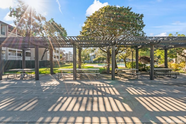 view of property's community featuring a pergola