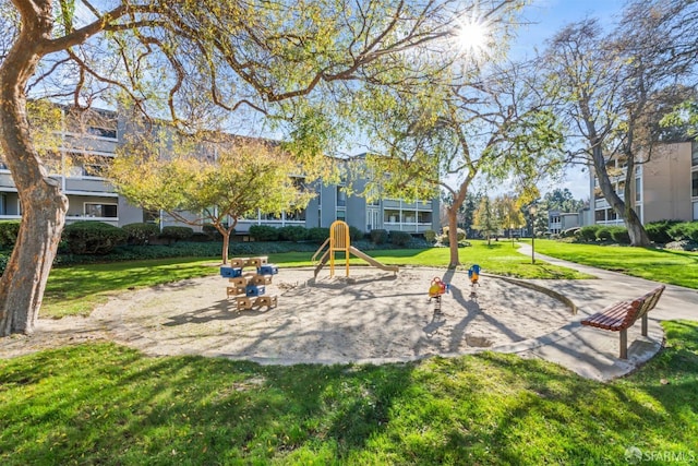 view of play area featuring a yard