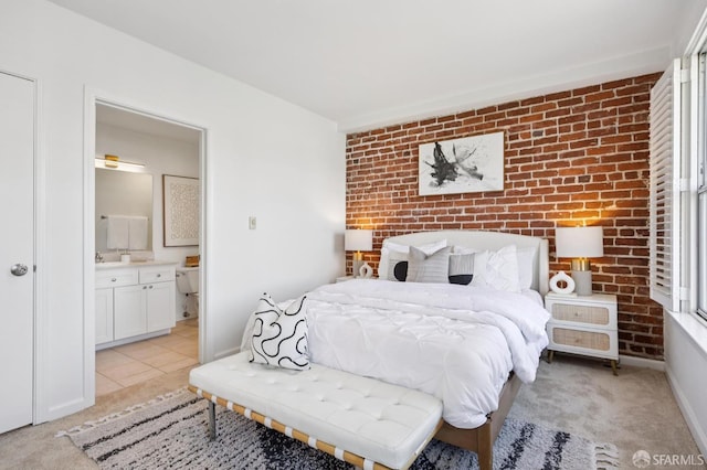 323 29th St Unit C301, San Francisco, CA 94131 - bedroom with brick wall, light carpet, ensuite bath, and an accent wall