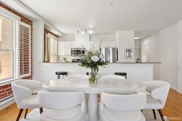 323 29th St Unit C301, San Francisco, CA 94131 - dining space with light wood-style flooring