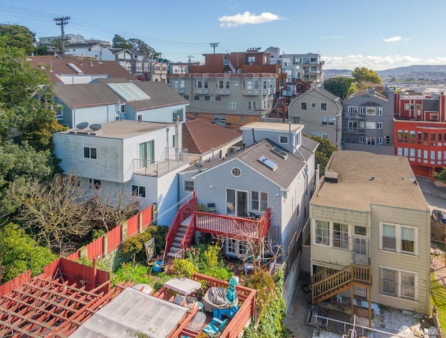 birds eye view of property with a residential view