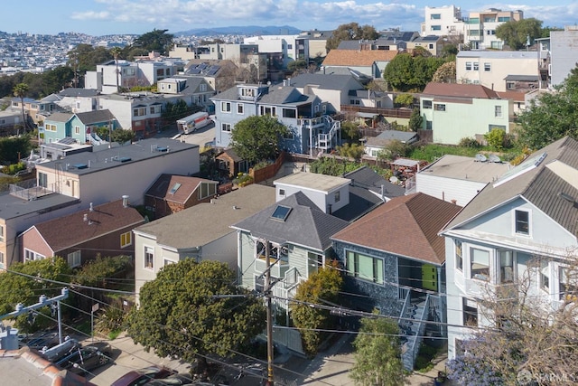 birds eye view of property with a residential view