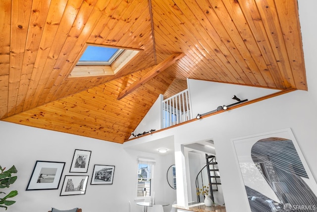 details featuring a skylight and wooden ceiling