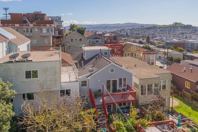 birds eye view of property featuring a mountain view and a residential view