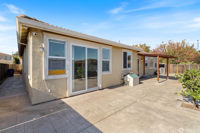 rear view of house with a patio area