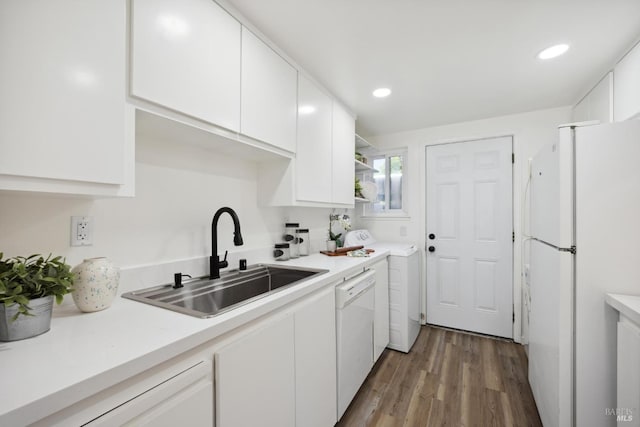 700 Samoa Ln, Novato, CA 94947 - kitchen with a sink, white appliances, washer / clothes dryer, white cabinetry, and light countertops