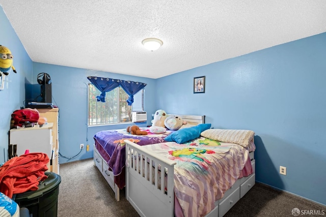 carpeted bedroom with a textured ceiling