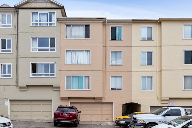 view of building exterior featuring a garage