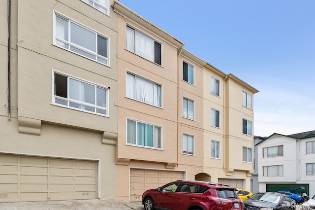 view of building exterior featuring a garage