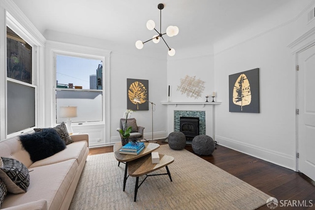 59 Octavia St, San Francisco, CA 94102 - living area with a chandelier, dark wood finished floors, baseboards, and a tiled fireplace