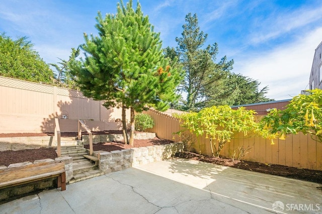 view of patio featuring a fenced backyard