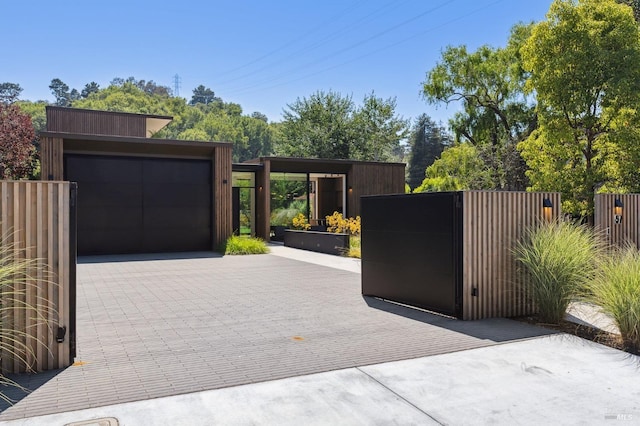 view of gate with fence