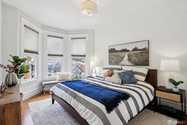 1483 Guerrero St, San Francisco, CA 94110 - bedroom featuring multiple windows and wood finished floors