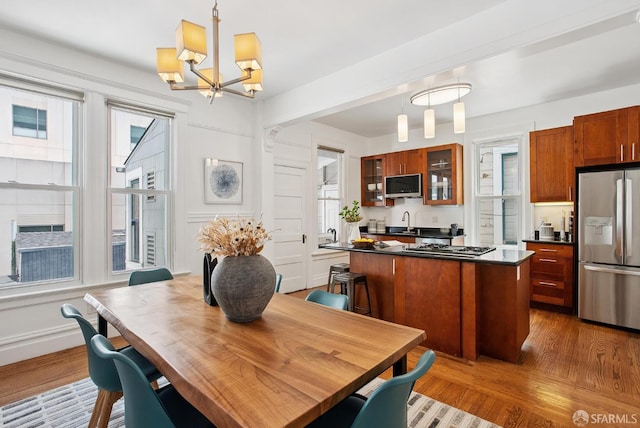 1483 Guerrero St, San Francisco, CA 94110 - dining space with a chandelier and wood finished floors