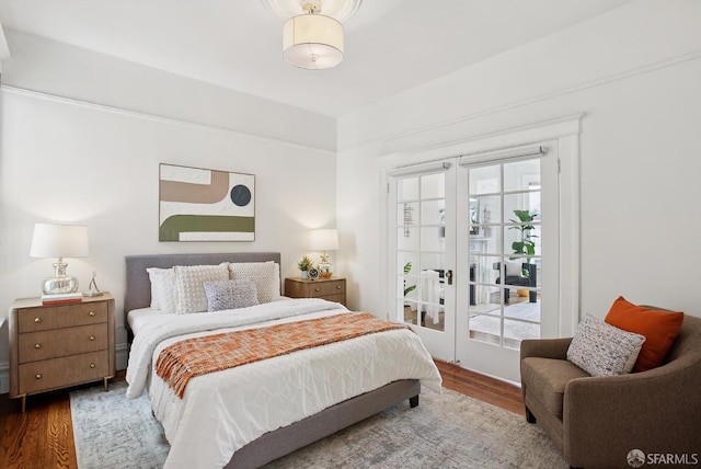 1483 Guerrero St, San Francisco, CA 94110 - bedroom featuring french doors, wood finished floors, and multiple windows