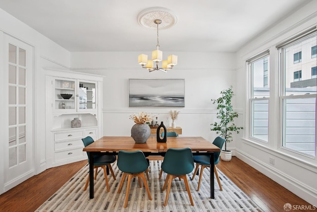 1483 Guerrero St, San Francisco, CA 94110 - dining space with a chandelier and wood finished floors