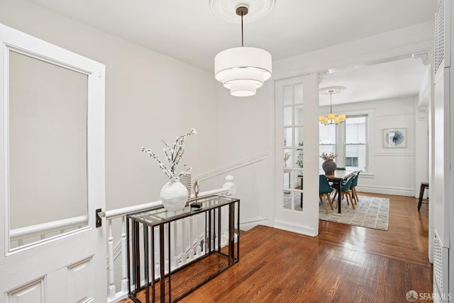 1483 Guerrero St, San Francisco, CA 94110 - corridor featuring an upstairs landing, a chandelier, and wood finished floors