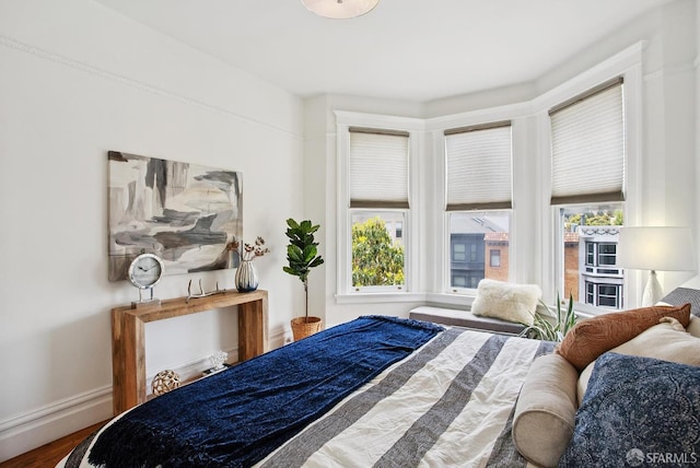 1483 Guerrero St, San Francisco, CA 94110 - bedroom featuring multiple windows and wood finished floors