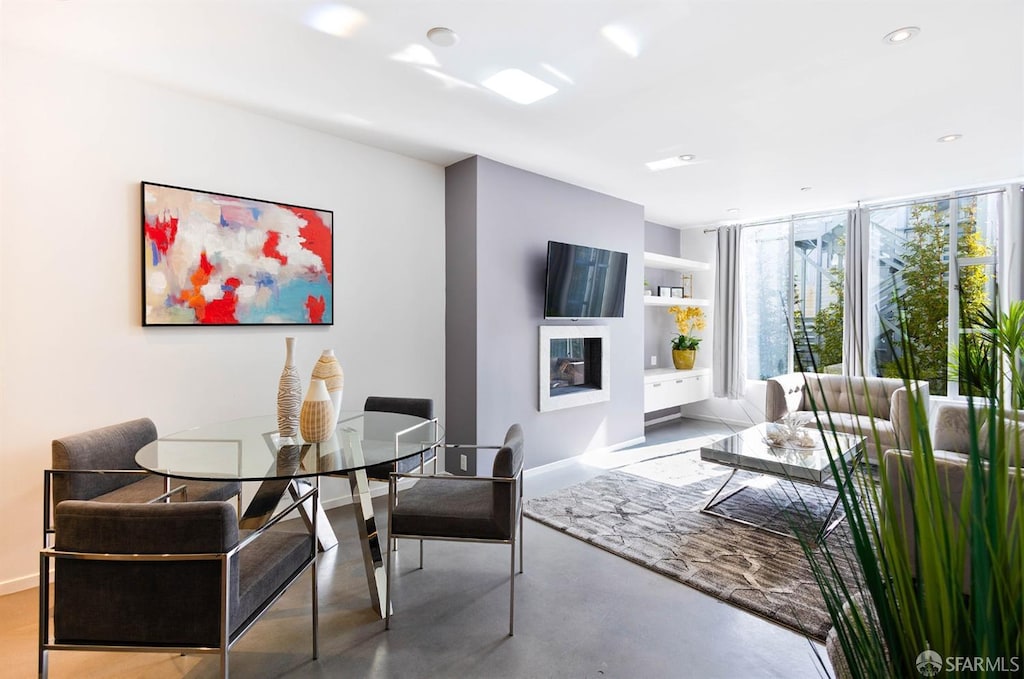 dining room with concrete floors