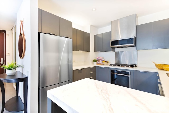 kitchen featuring gray cabinetry and stainless steel appliances